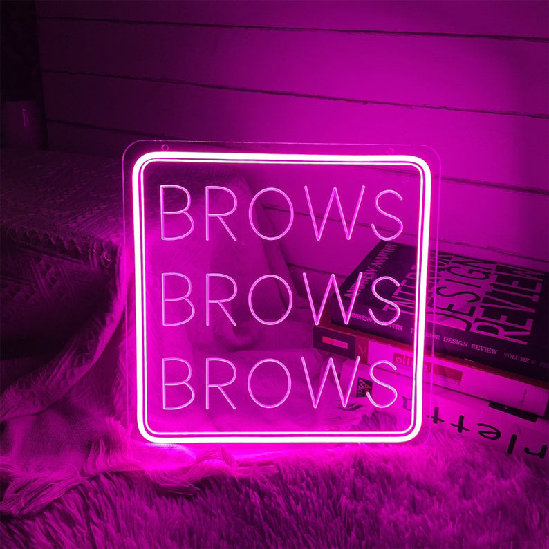 Brows Brows Brows Neon, Neon sign, Beauty salon decor, Eyebrow shaping, Brow-centric salon, Vibrant lighting, Stylish ambiance, Illuminated sign, Trendy neon sign, Chic beauty studio, Salon atmosphere, Brow artist pride, Eyebrow obsession.Trendy, Chic, Glamorous, Stylish, Bold, Eye-catching, Fashionable, Sophisticated, Vibrant, Iconic, Striking, Unique, Sleek, Modern, Alluring,