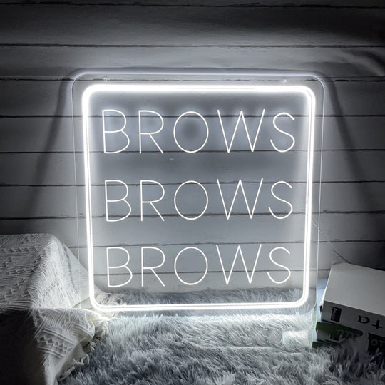 Brows Brows Brows Neon, Neon sign, Beauty salon decor, Eyebrow shaping, Brow-centric salon, Vibrant lighting, Stylish ambiance, Illuminated sign, Trendy neon sign, Chic beauty studio, Salon atmosphere, Brow artist pride, Eyebrow obsession.Trendy, Chic, Glamorous, Stylish, Bold, Eye-catching, Fashionable, Sophisticated, Vibrant, Iconic, Striking, Unique, Sleek, Modern, Alluring,