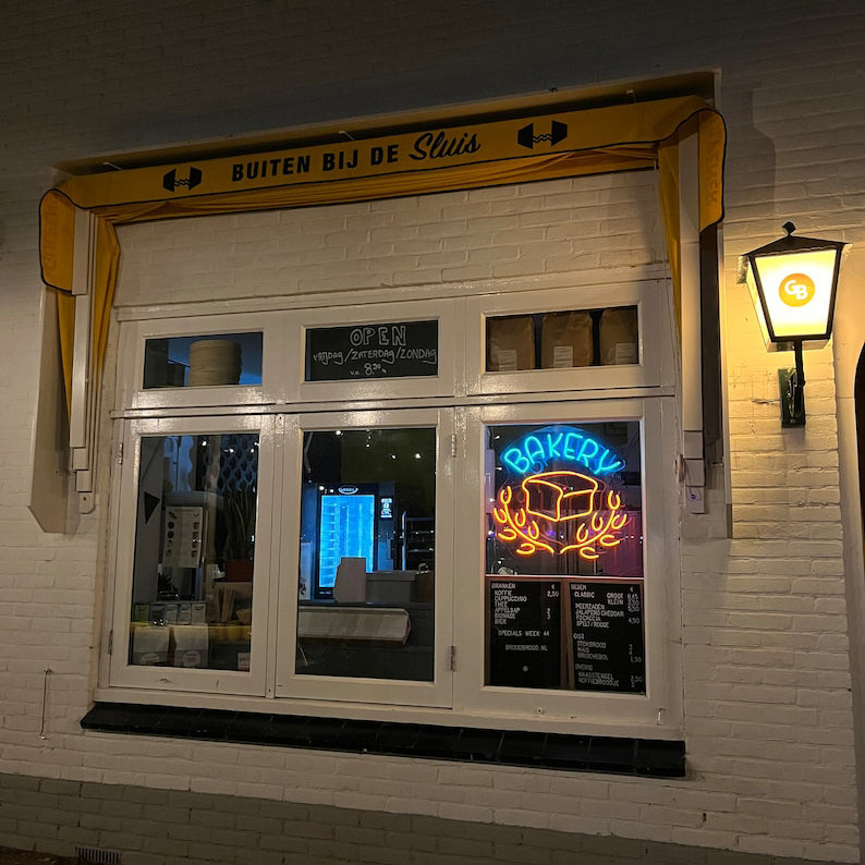 Baker with Bread neon, Neon sign, Bakery decor, Bread-themed signage, Vibrant lighting, Stylish ambiance, Illuminated sign, Trendy neon sign, Chic bakery, Artisan bread, Bakery atmosphere