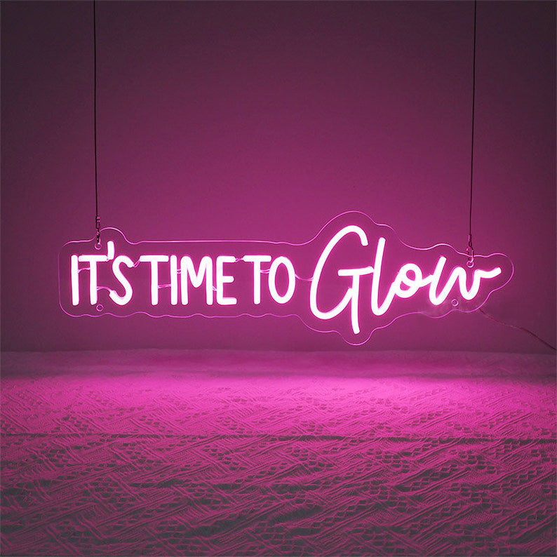 It's Time to Glow Neon, Neon sign, Beauty salon decor, Illuminated sign, Glow-themed salon, Vibrant lighting, Stylish ambiance, Trendy neon sign, Chic beauty studio, Salon atmosphere, Glow-up vibes.